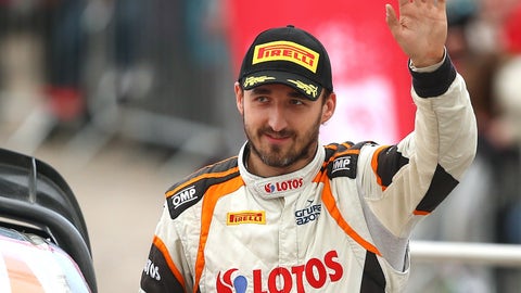 Robert Kubica of Poland waves to the crowd during the finishing ceremony of the FIA World Rally Championship in Great Britain on Nov.r 15 2015 in Deeside Wales