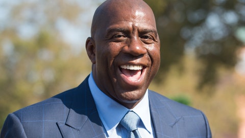Magic returns to Lakers as adviser for Buss