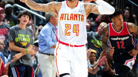 Hawks deliver early playoff KO, romp past Wizards 116-98