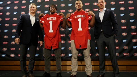 Slides (Foster), surges (Davis) from 1st round of NFL draft