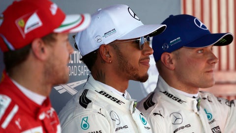 Strategy, teamwork help Hamilton win Spanish GP over Vettel