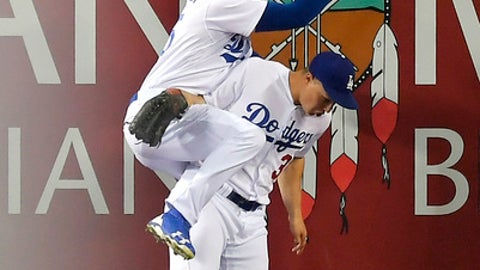 Pederson leaves game after frightening collision with Puig Pederson leaves game after frightening collision with Puig