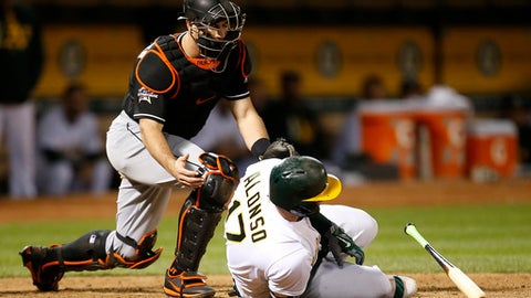 Yankees held hitless into 6th by Cotton, but beat A's 3-2