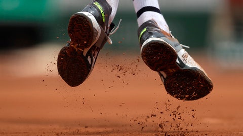 At French Open, del Potro gets lost off court, wins on it