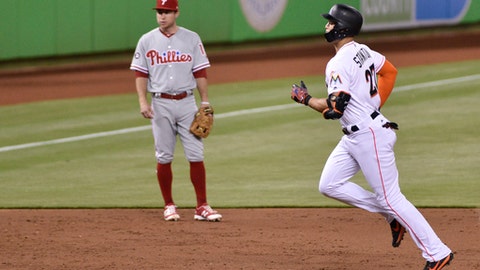 Bour's 2 HRs help Marlins beat woeful Phils 10-2