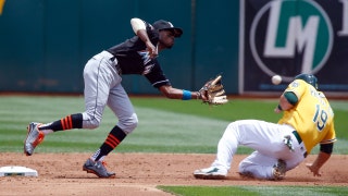 WATCH: J.T. Realmuto puts his cannon on display against A's