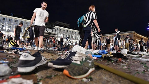 200 injured in Juventus fan panic after bomb scare