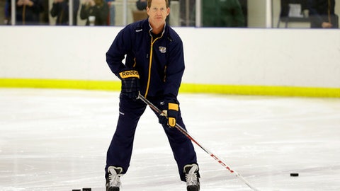 Nashville Predators assistant coach Phil Housley watches players at NHL hockey training camp Friday Sept. 18 2015 in Nashville Tenn