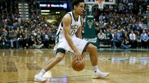 MILWAUKEE WI- APRIL 27 Malcolm Brogdon #13 of the Milwaukee Bucks dribbles the ball in the second quarter in Game Six of the Eastern Conference Quarterfinals against the Toronto Raptors during the 2017 NBA Playoffs at BMO Harris Bradley Center on Apri