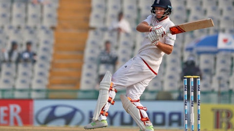 Root playing a shot on the fourth day of their third cricket test match against India in Mohali India. The prospect of both teams being under new captains adds extra intrigue _ and a sligh