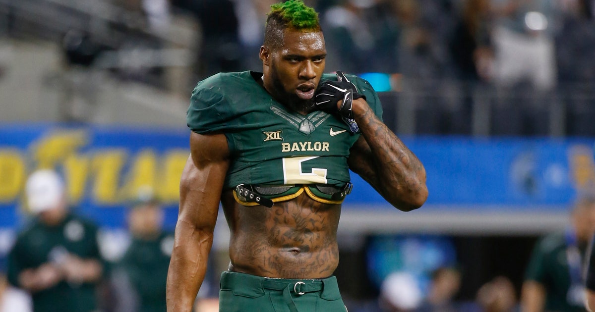 WATCH Baylor's ripped Oakman cranks out pullups with 120 pounds FOX