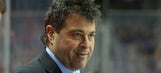 Islanders coach Jack Capuano gets hit in the face by puck in Game 1
