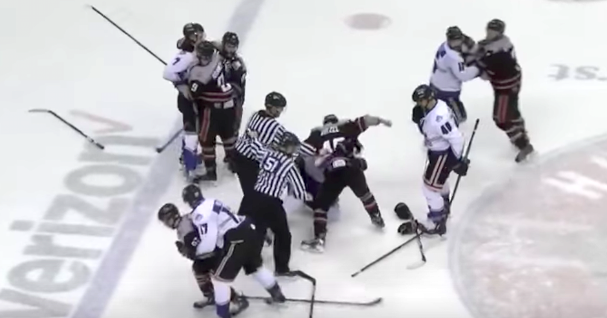 Hockey player deliberately shoots puck into opposing bench, sparks
