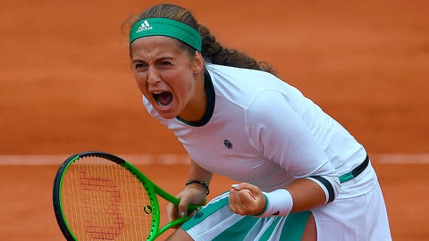 Latvia's Jelena Ostapenko reacts after scoring during her tennis match against Denmark's Caroline Wozniacki at the Roland Garros 2017 French Open on June 6, 2017 in Paris.  / AFP PHOTO / GABRIEL BOUYS        (Photo credit should read GABRIEL BOUYS/AFP/Getty Images)