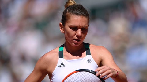 Romania's Simona Halep reacts after a point against Latvia's Jelena Ostapenko during their final tennis match at the Roland Garros 2017 French Open on June 10, 2017 in Paris.  / AFP PHOTO / Eric FEFERBERG        (Photo credit should read ERIC FEFERBERG/AFP/Getty Images)