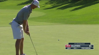 Will Zalatoris sinks a long putt for birdie on the 18th