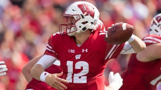 No.10 Wisconsin overcomes turnover problems to defeat Northwestern 33-24