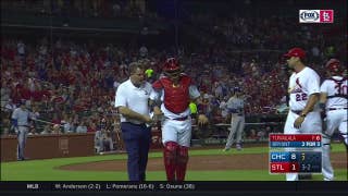 WATCH: Yadi leaves game after taking back-to-back foul balls off the mask