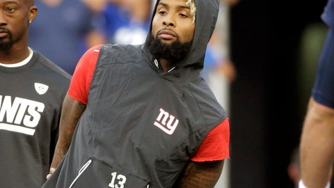 New York Giants wide receiver Odell Beckham watches his teammates warm up before an NFL preseason football game against the New England Patriots in Foxborough Mass. Beckham Jr. has been listed as questionable