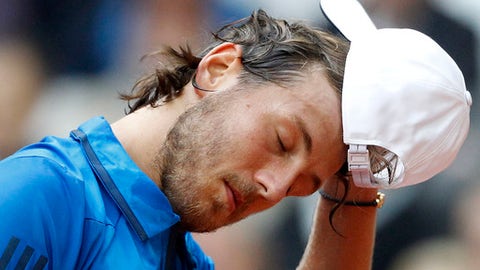 France's Lucas Pouille reacts to Dusan Lajovic of Serbia during their Davis Cup semi final at the Pierre Mauroy stadium in Lille northern France Friday Sept.15 2017