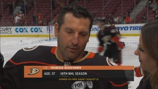 Jill Painter Lopez chats with Ducks defenseman Francois Beauchemin