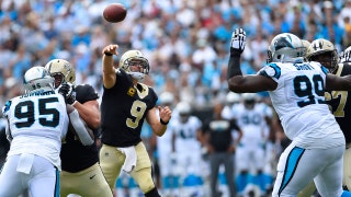 Easy Brees-y: Drew Brees heaves a 40-yard TD strike to Ted Ginn Jr. in the Saints' 34-13 rout over the Panthers