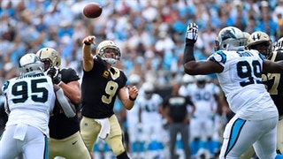 Easy Brees-y: Drew Brees heaves a 40-yard TD strike to Ted Ginn Jr. in the Saints' 34-13 rout over the Panthers