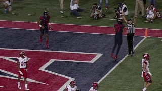 Arizona's Brandon Dawkins scores with a 1-yd touchdown run