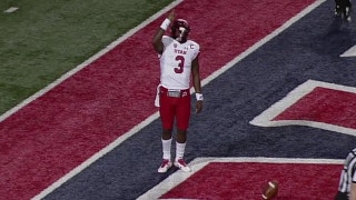 Utah's Troy Williams scores on a 1-yd touchdown run