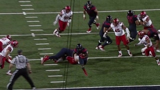 Arizona's J.J. Taylor scores on a 7-yd touchdown run