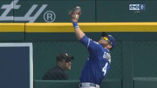 Alex Gordon times his leap and elevates at the wall to rob Mikie Mahtook of a 3-run blast