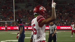 Utah's Tyler Huntley connects with an 8-yd touchdown pass to Samson Nacua