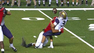 Watch Washington's Jake Browning take a big hit early for a loss of 9 yards