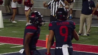 Arizona's Brandon Dawkins connects with Tony Ellison for a 30-yd touchdown pass