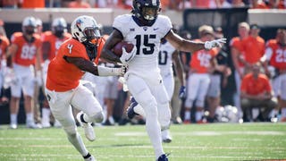 Kenny Hill and the No. 16 TCU Horned Frogs silence the No. 6 Oklahoma State Cowboys in 44-31 upset