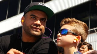 Shawne Merriman launches 'Lights Out Drive' youth initiative, takes 100 students to a race at Dover International Speedway