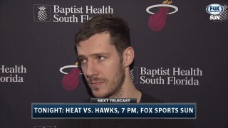Heat enjoying James Johnson's powerful approach to finishing at the rim