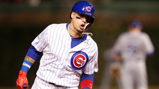 Javier Baez hits 2 solo shots off Alex Wood as Chicago fends off LA in Game 4