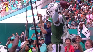 New York Jets WR Robby Anderson celebrates TD by leaping into the stands and taking a seat