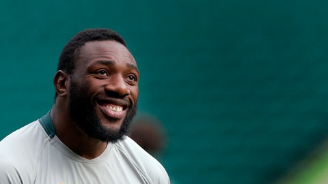 South Africa's Tendai Mtawarira smiles during a training session at Twickenham Stadium London. First-choice props Tendai Mtawarira and Coenie Oosthuizen are back for South Africa against Ireland at La