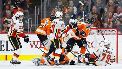 Monahan's 1st hat trick fuels Flames