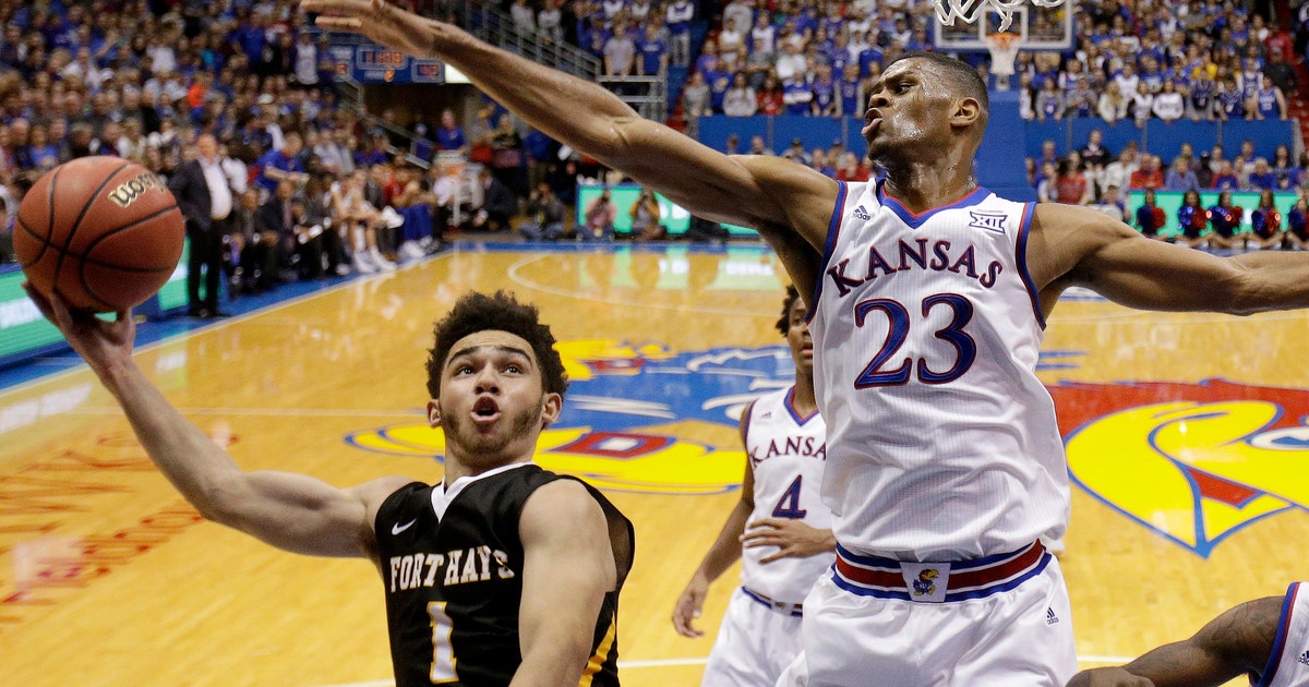 Preston sits for No. 4 Kansas as investigation into on-campus incident