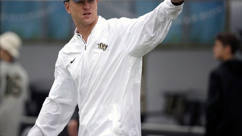 Central Florida head coach Scott Frost waves to fans as he takes the field before an NCAA college football game against South Florida in Orlando Fla. Nebraska fans are gearing up for what to them seems to be the