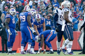 
					Bills QB Taylor held out of practice due to bruised knee
				