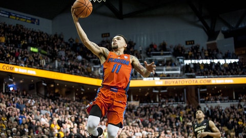 Chiozza helps Florida steal win at Missouri