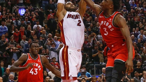 TORONTO ON- JANUARY 9 Miami Heat guard Wayne Ellington nails down the winner as Toronto Raptors forward OG Anunoby defends. Toronto Raptors vs Miami Heat in 2nd half action of NBA regular season play at Air Canada Centre. Raptors lose 90-89. To