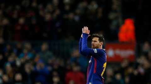FC Barcelona's Lionel Messi applauds during the Spanish Copa del Rey round of 16 second leg soccer match between FC Barcelona and Celta de Vigo at the Camp Nou stadium in Barcelona Spain Thursday Jan. 11 2018
