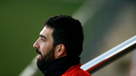 FC Barcelona's Arda Turan takes part in a training session at the Sports Center FC Barcelona Joan Gamper in Sant Joan Despi Spain. Barcelona says Arda Turan will play on loan with Turkish club Istanbul