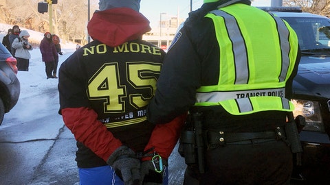 Black Lives Matter protesters arrested after blocking light rail to Super Bowl Black Lives Matter protesters arrested after blocking light rail to Super Bowl