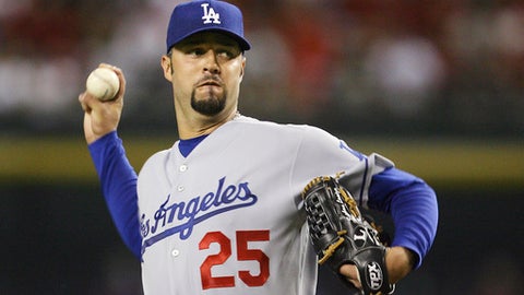 Los Angeles Dodgers' Esteban Loaiza of Mexico throws a pitch against the Arizona Diamondbacks in the first inning of a baseball game in Phoenix. Former All Star pitcher Loaiza- who earned a total of more